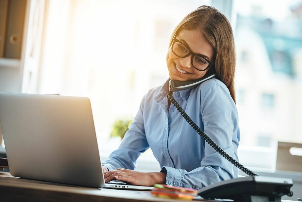 Woman on business telephone